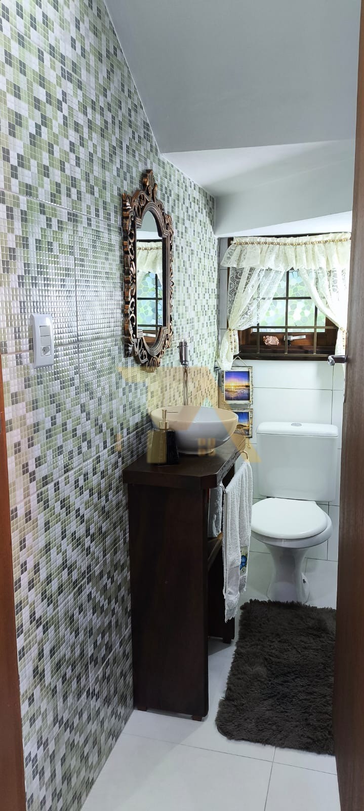Casa com Piscina e Jardim na Lagoa de Ibiraquera Imbituba - SC
