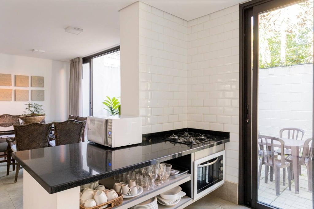 Linda casa em condominio com 5 dormitórios em Camburi localização privilegiada