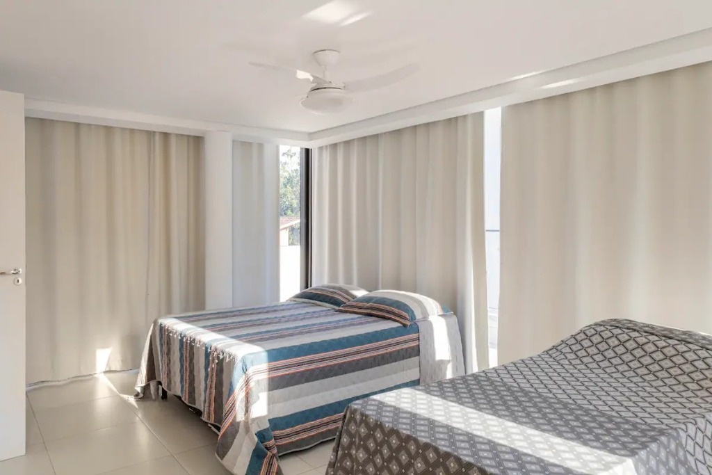 Linda casa em condominio com 5 dormitórios em Camburi localização privilegiada