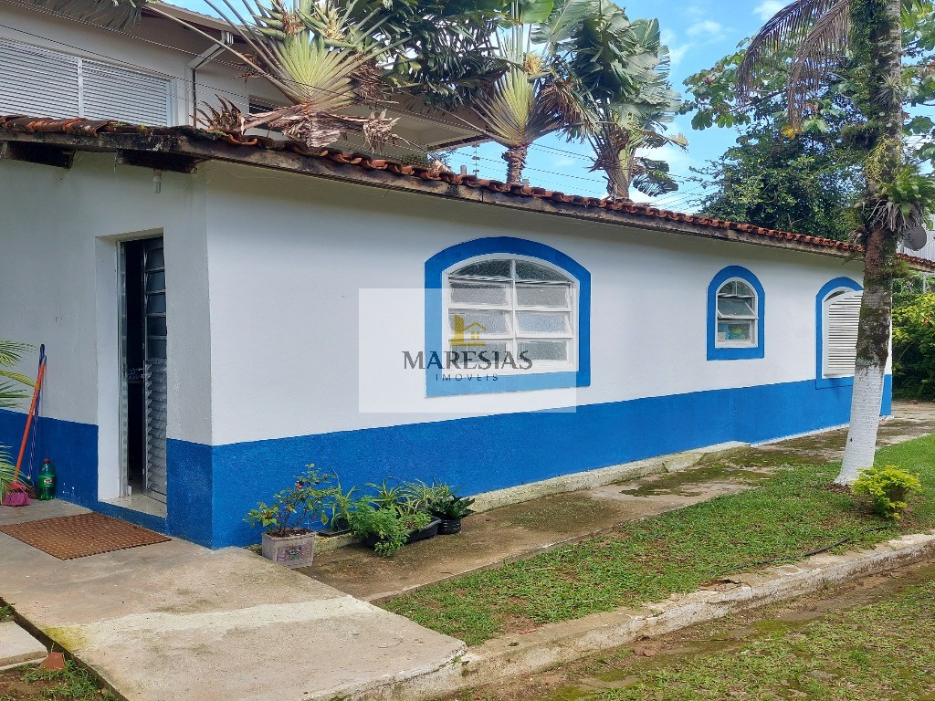 Casa com piscina a menos de 300 metros da praia Boiçucanga