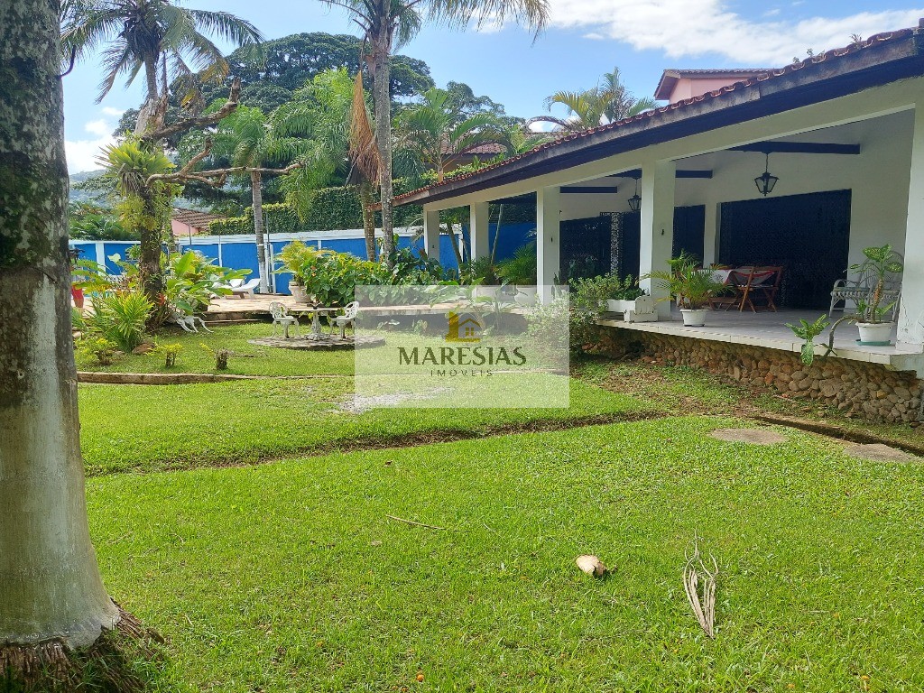Casa com piscina a menos de 300 metros da praia Boiçucanga