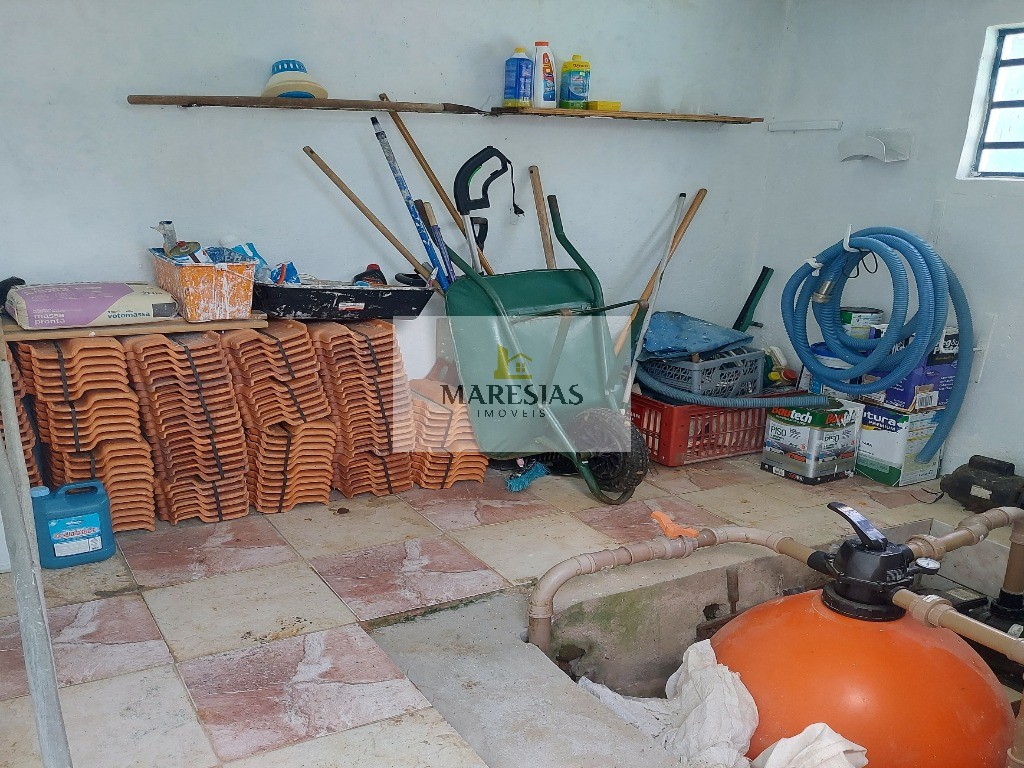 Casa com piscina a menos de 300 metros da praia Boiçucanga