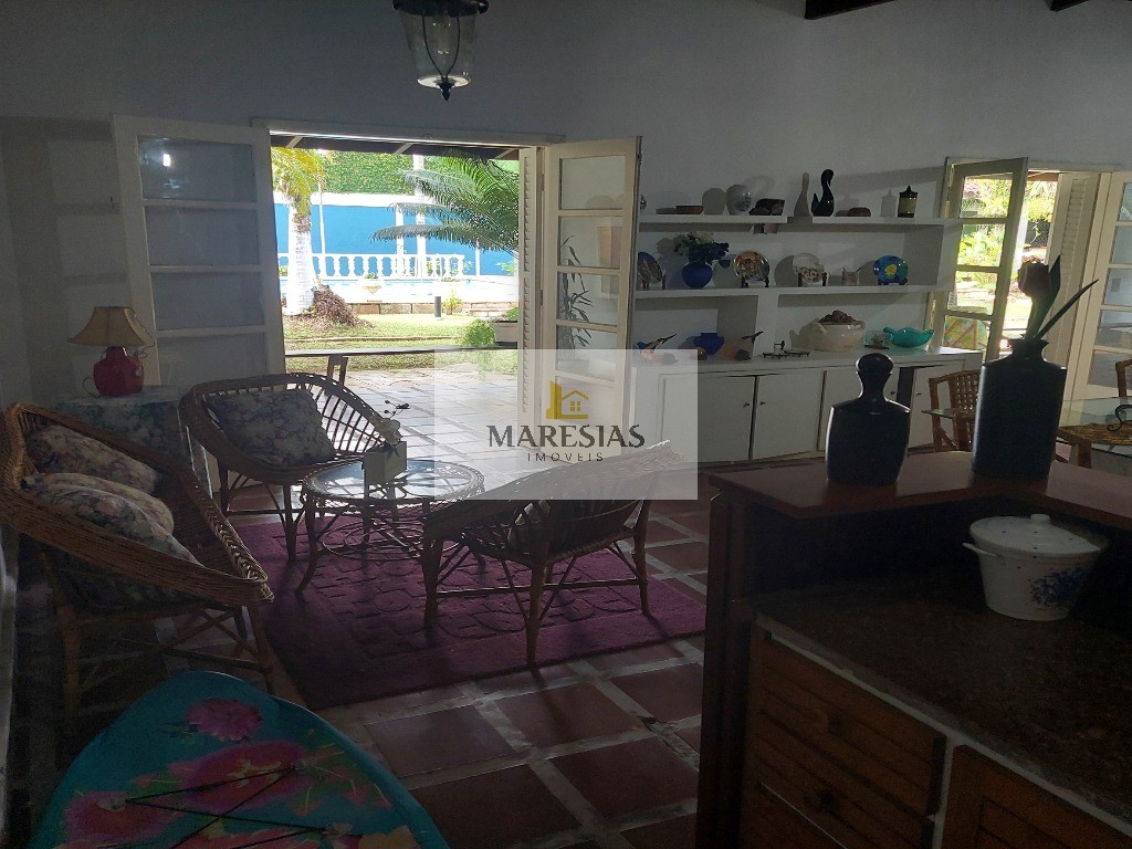 Casa com piscina a menos de 300 metros da praia Boiçucanga