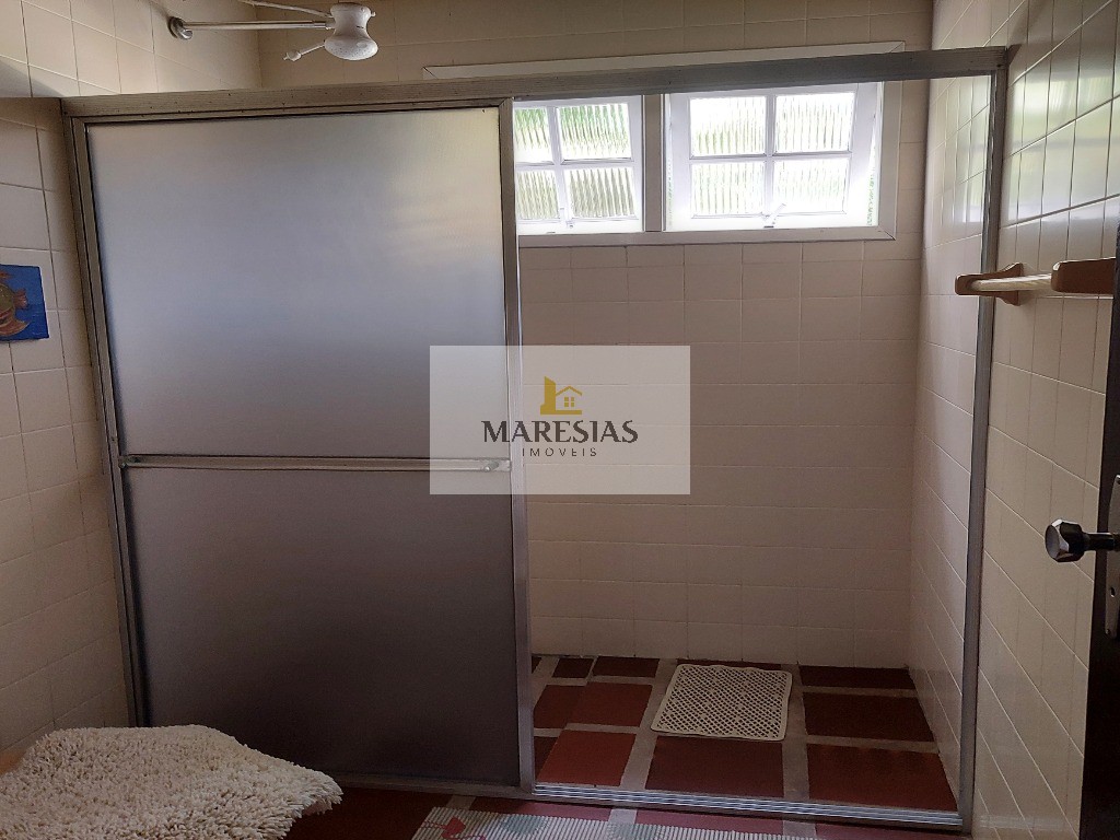 Casa com piscina a menos de 300 metros da praia Boiçucanga