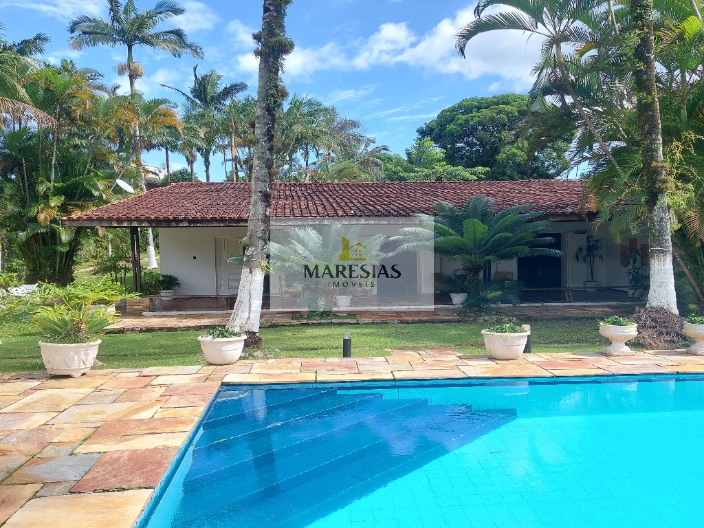 Casa com piscina a menos de 300 metros da praia Boiçucanga