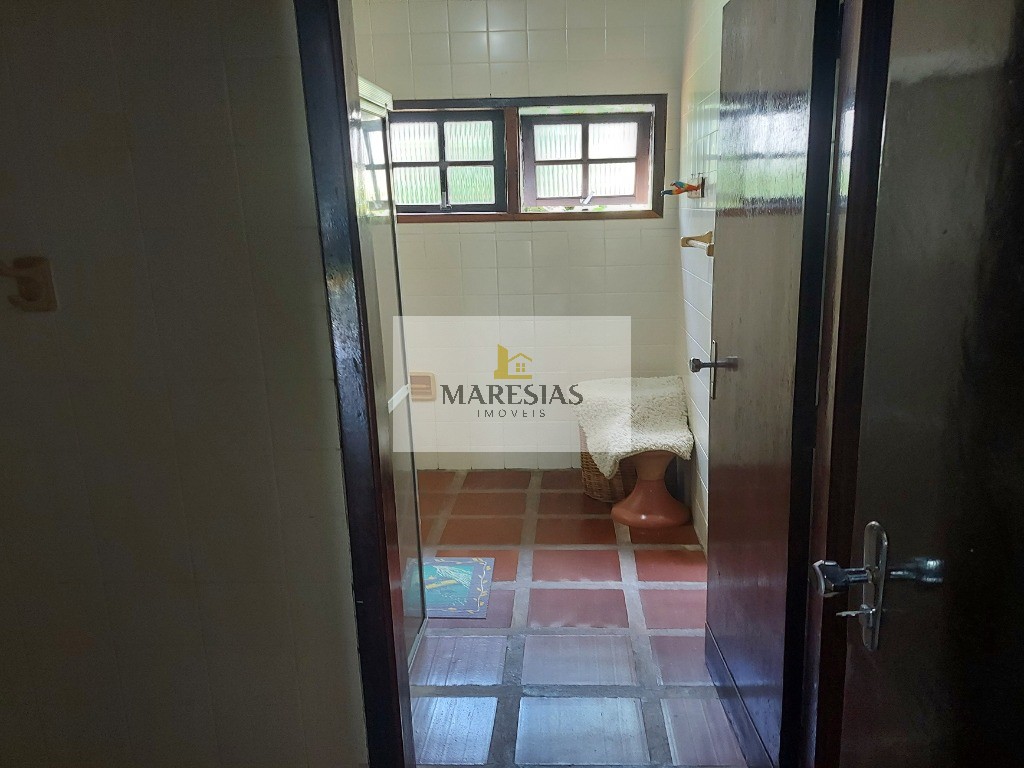 Casa com piscina a menos de 300 metros da praia Boiçucanga