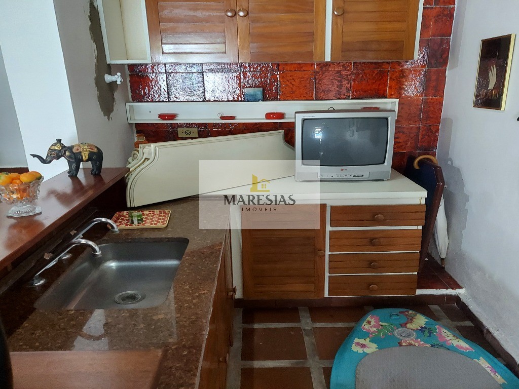 Casa com piscina a menos de 300 metros da praia Boiçucanga