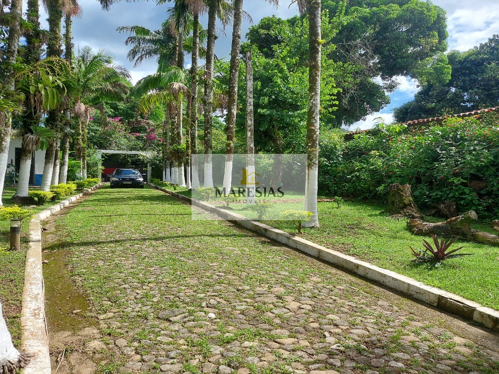 Casa com piscina a menos de 300 metros da praia Boiçucanga
