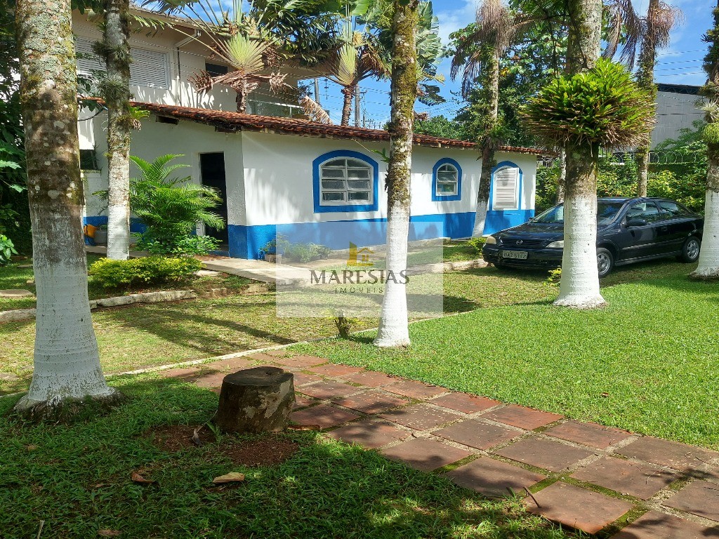 Casa com piscina a menos de 300 metros da praia Boiçucanga