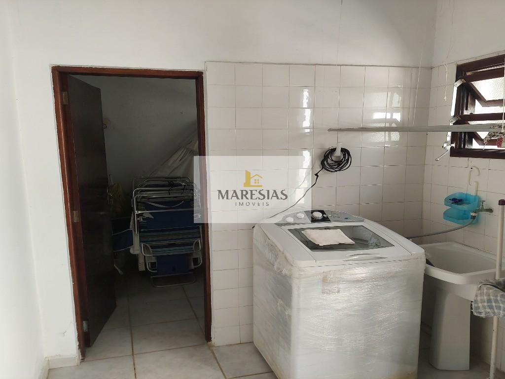 Casa com piscina a menos de 300 metros da praia Boiçucanga