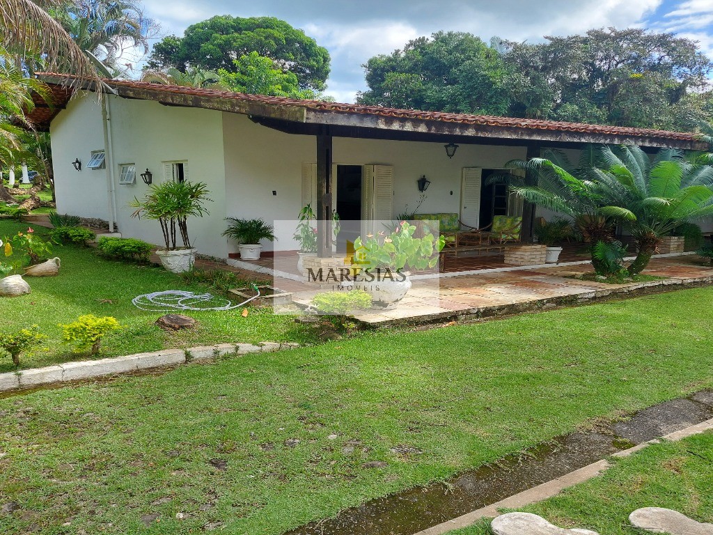 Casa com piscina a menos de 300 metros da praia Boiçucanga