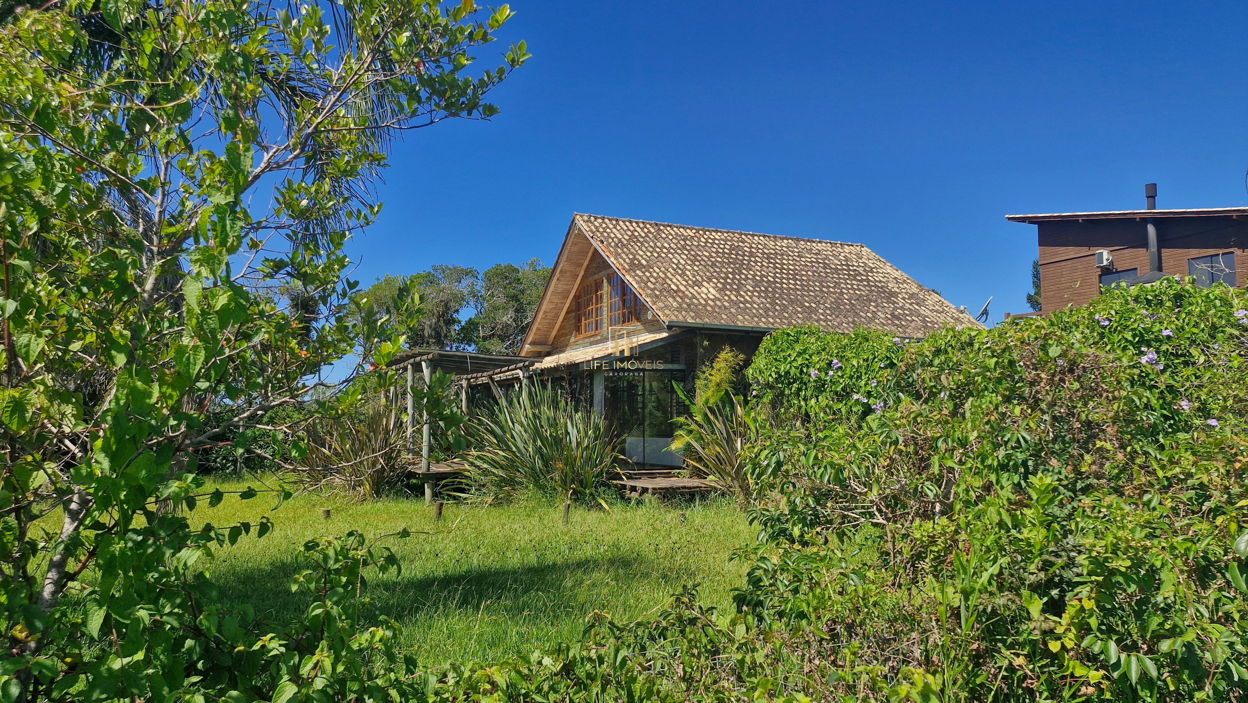 Casa Espaçosa com Vista para Lagoa em Ibiraquera, Imbituba-SC