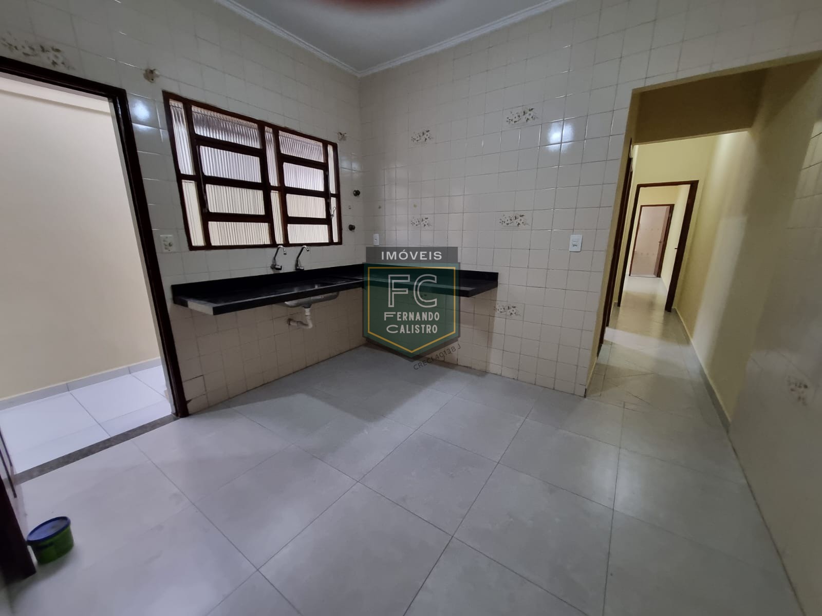 Casa térrea reformada 2 dormitórios (1 suíte) próxima ao cen
