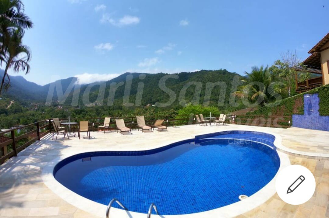 TRIPLEX À VENDA COM VISTA PARA CACHOEIRA EM CONDOMÍNIO FECHADO COM PISCINA EM ILHABELA -SP.
