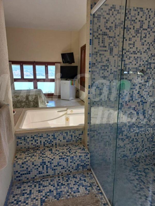 CASA/SOBRADO À VENDA COM ESPETACULAR VISTA PARA O MAR, ÁREA GOURMET COM PISCINA E CHURRASQUEIRA; 5 SUÍTES; ITAGUASSU, ILHABELA.