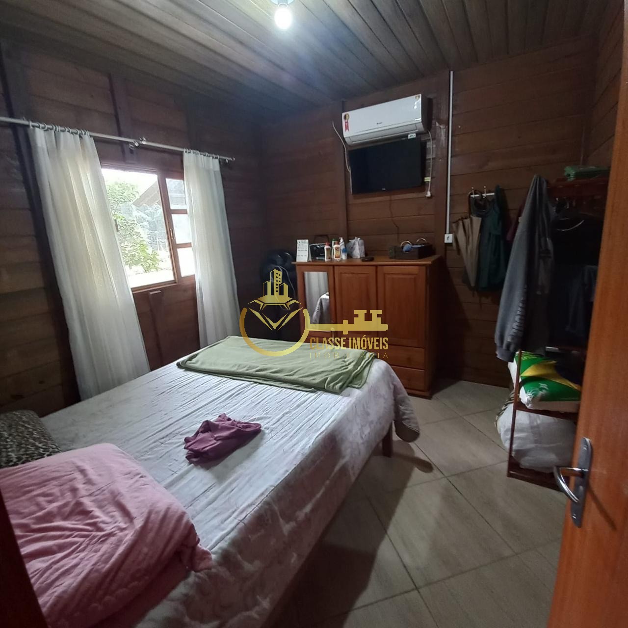 Chácara à venda em São João do Itaperiú-SC, bairro Santa Cruz: 2 quartos, 2 salas, 1 banheiro, 56m² de área