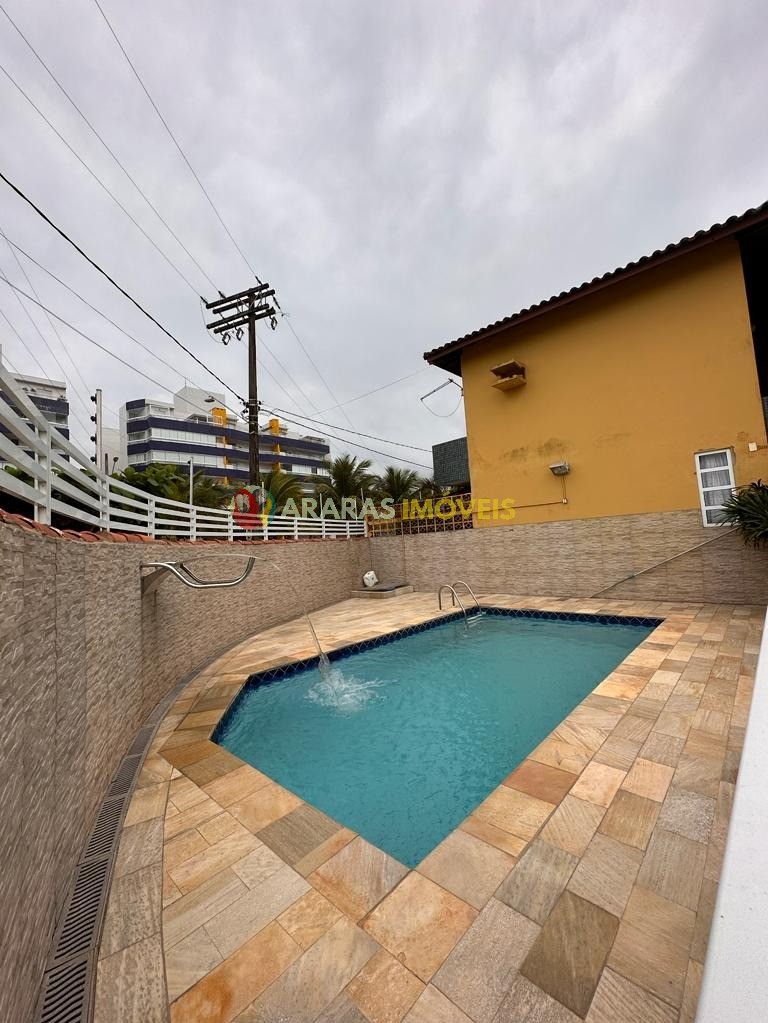 Sobrado mobiliado em villagio frente para o mar por R$ 550.000,00 no maitinga-bertioga/sp