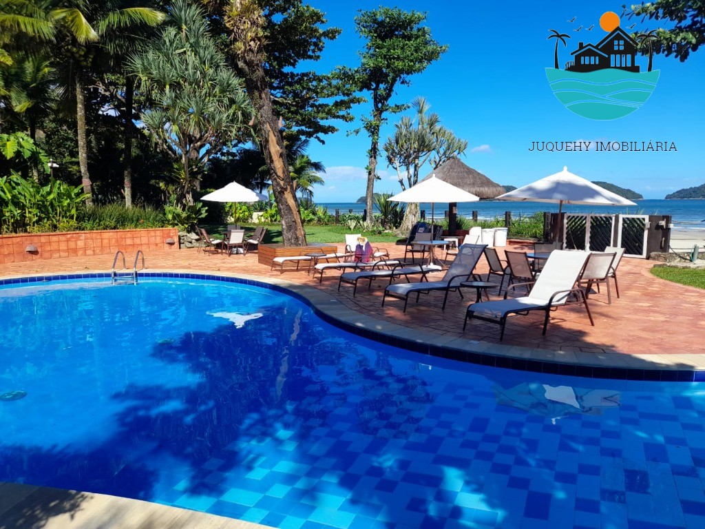 Aluguel Juquehy - Casa em cond. Pé na areia com 4 suítes, piscina, sauna, 2 vagas, serv, praia - Acomodação 11 pessoas Juquehy Imobiliária