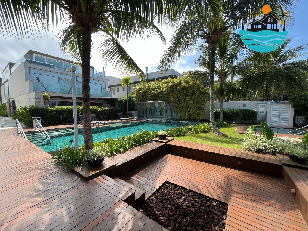 Casa em condomínio pé na areia, à venda em Juquehy com 5 suítes, piscina privativa e 340m² de área construída Juquehy Imobiliária