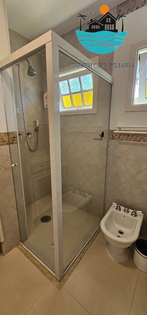 Casa para alugar em condomínio fechado pé na areia com vista ao mar em Juquehy, com 4 suítes, - Acomodação máx. 10 pessoas Juquehy Imobiliária