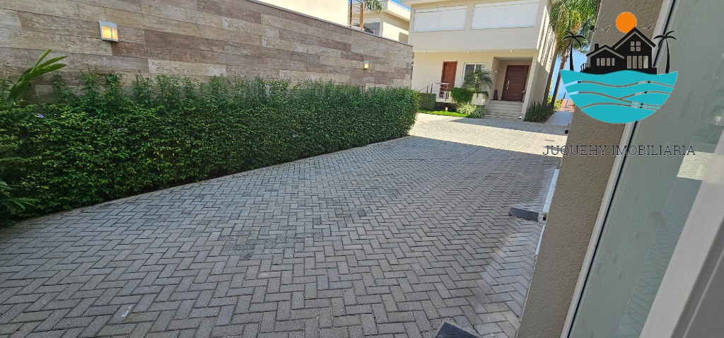 Casa em condomínio pé na areia - Temporada, com 5 suítes, 1 térrea, serviço de praia, acomodação para 14 pessoas, 4 vagas Juquehy Imobiliária