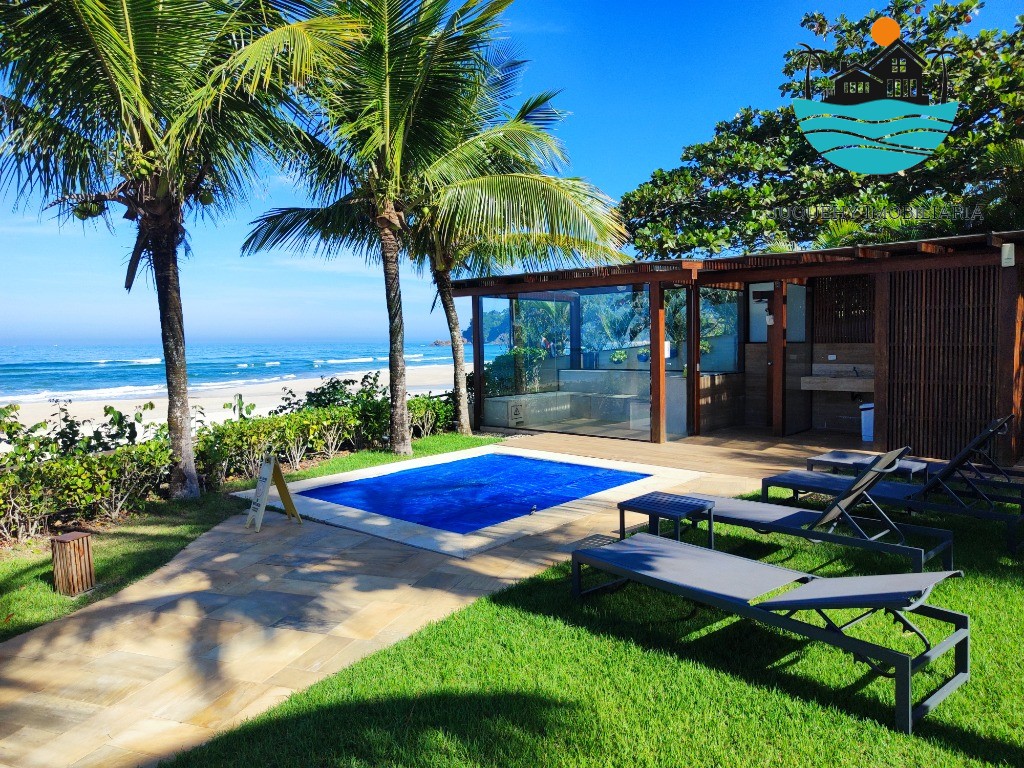Casa Pé na Areia Juquehy, com 5 suítes, lado direito da praia, Sala de TV, 06 banheios, 02 vagas para Auto, max. 10 pessoas Juquehy Imobiliária