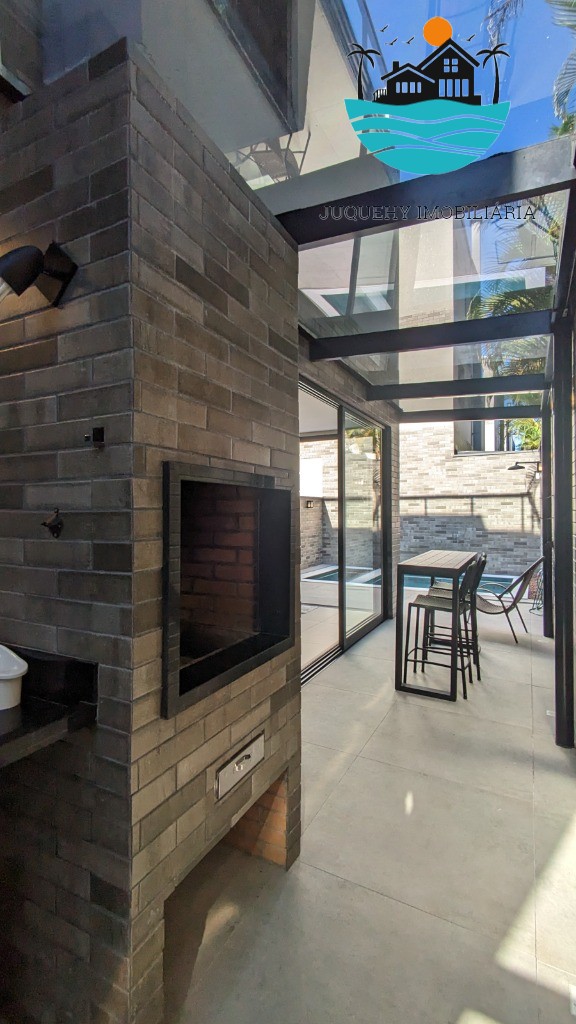 Casa a venda em condomínio pé na areia em Juquehy, aluguel de Tempora, 5 Suítes, Terraço gourment, piscina priv. 02 vagas auto Juquehy Imobiliária