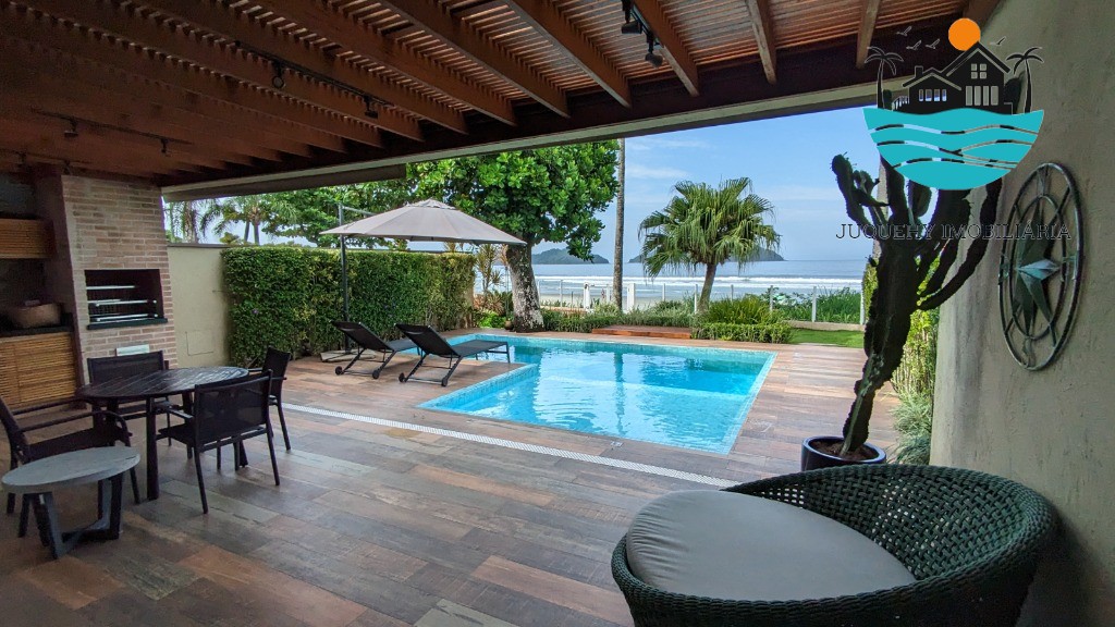 Casa Pé na Areia a venda em Juquehy, 4 Suítes, Piscina privativa com vista para o Mar, serviço de praia, 02 vagas auto Juquehy Imobiliária