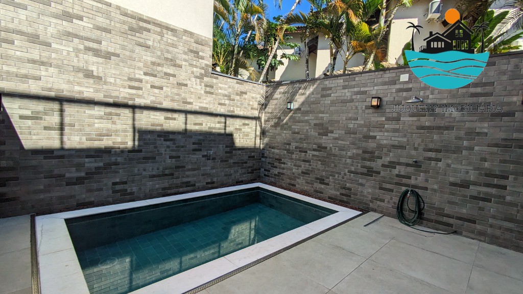 Casa a venda em condomínio pé na areia em Juquehy, aluguel de Tempora, 5 Suítes, Terraço gourment, piscina priv. 02 vagas auto Juquehy Imobiliária