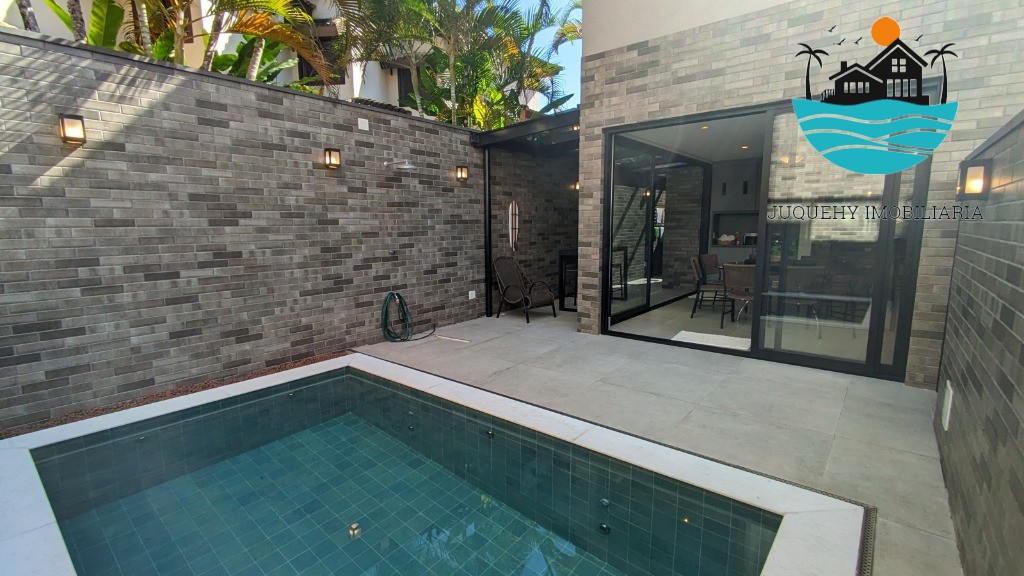 Casa a venda em condomínio pé na areia em Juquehy, aluguel de Tempora, 5 Suítes, Terraço gourment, piscina priv. 02 vagas auto Juquehy Imobiliária