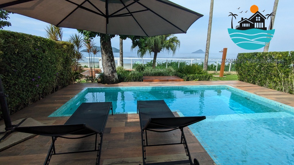 Casa Pé na Areia a venda em Juquehy, 4 Suítes, Piscina privativa com vista para o Mar, serviço de praia, 02 vagas auto Juquehy Imobiliária