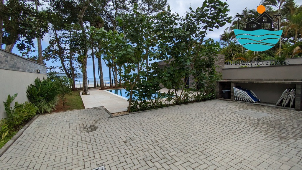 Casa a venda em condomínio pé na areia em Juquehy, aluguel de Tempora, 5 Suítes, Terraço gourment, piscina priv. 02 vagas auto Juquehy Imobiliária