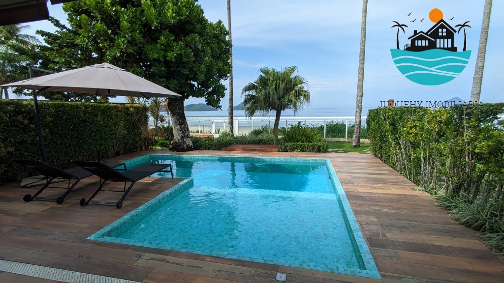 Casa Pé na Areia a venda em Juquehy, 4 Suítes, Piscina privativa com vista para o Mar, serviço de praia, 02 vagas auto Juquehy Imobiliária
