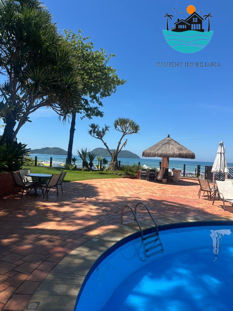 Aluguel Juquehy - Casa em cond. Pé na areia com 4 suítes, piscina, sauna, 2 vagas, serv, praia - Acomodação 11 pessoas Juquehy Imobiliária