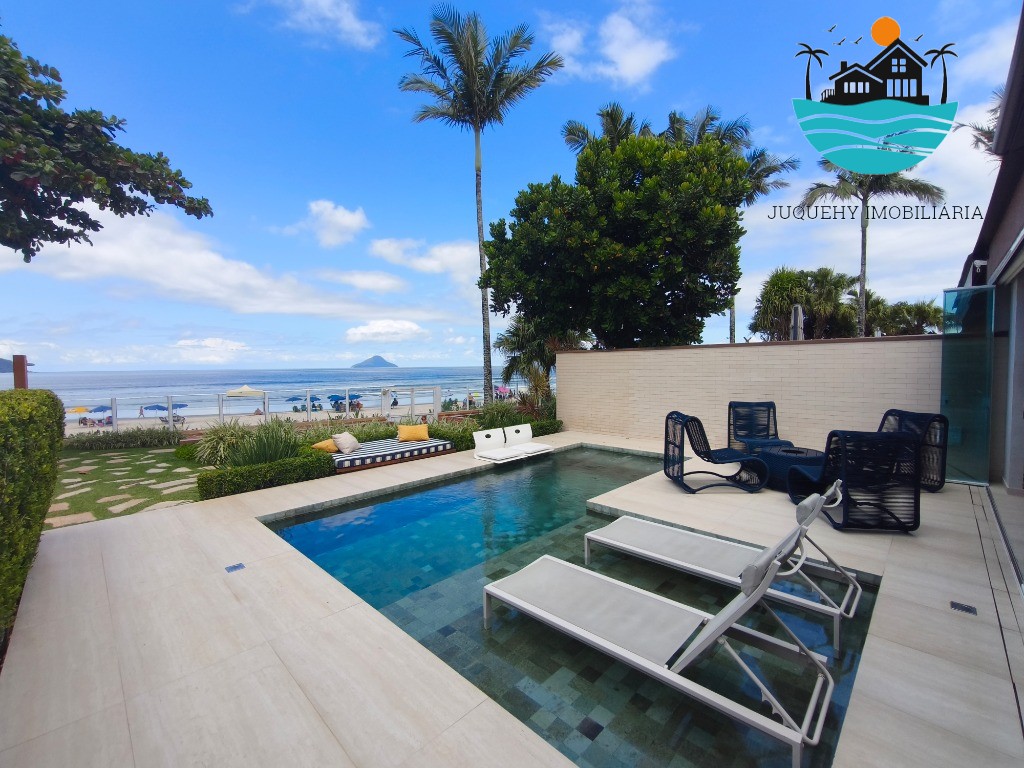 Casa Pé na Areia a venda em Juquehy, 4 Suítes, Piscina privativa com vista para o Mar, serviço de praia, 02 vagas auto Juquehy Imobiliária