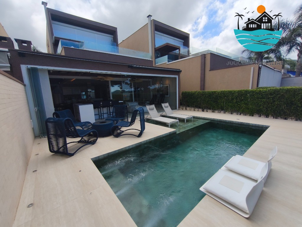 Casa Pé na Areia a venda em Juquehy, 4 Suítes, Piscina privativa com vista para o Mar, serviço de praia, 02 vagas auto Juquehy Imobiliária