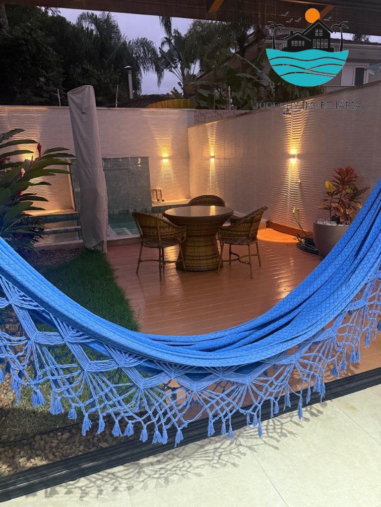 Casa Aluguel Juquehy com, 4 dormitórios, 3 suítes, acomodação para 10-12 pessoas e a 150m da praia Juquehy Imobiliária