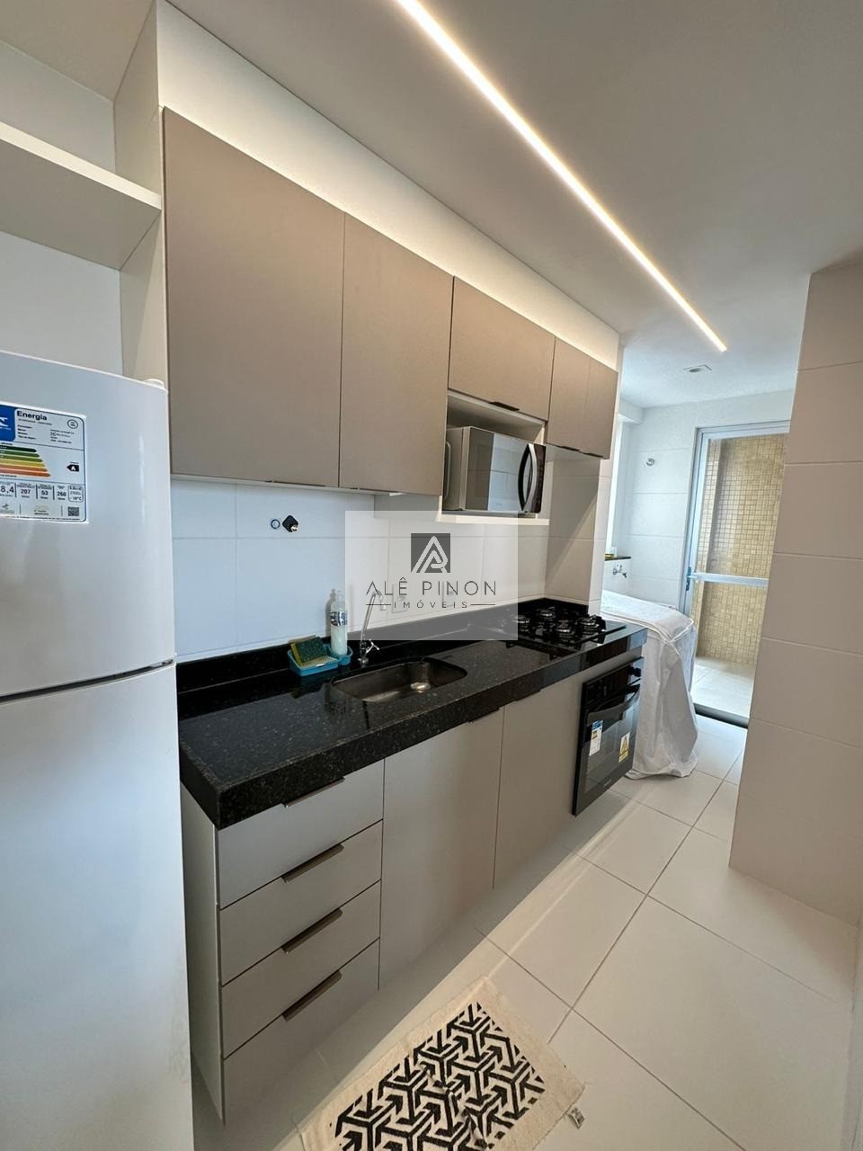 Espaçoso apartamento de 3 quartos com suíte e garagem em con