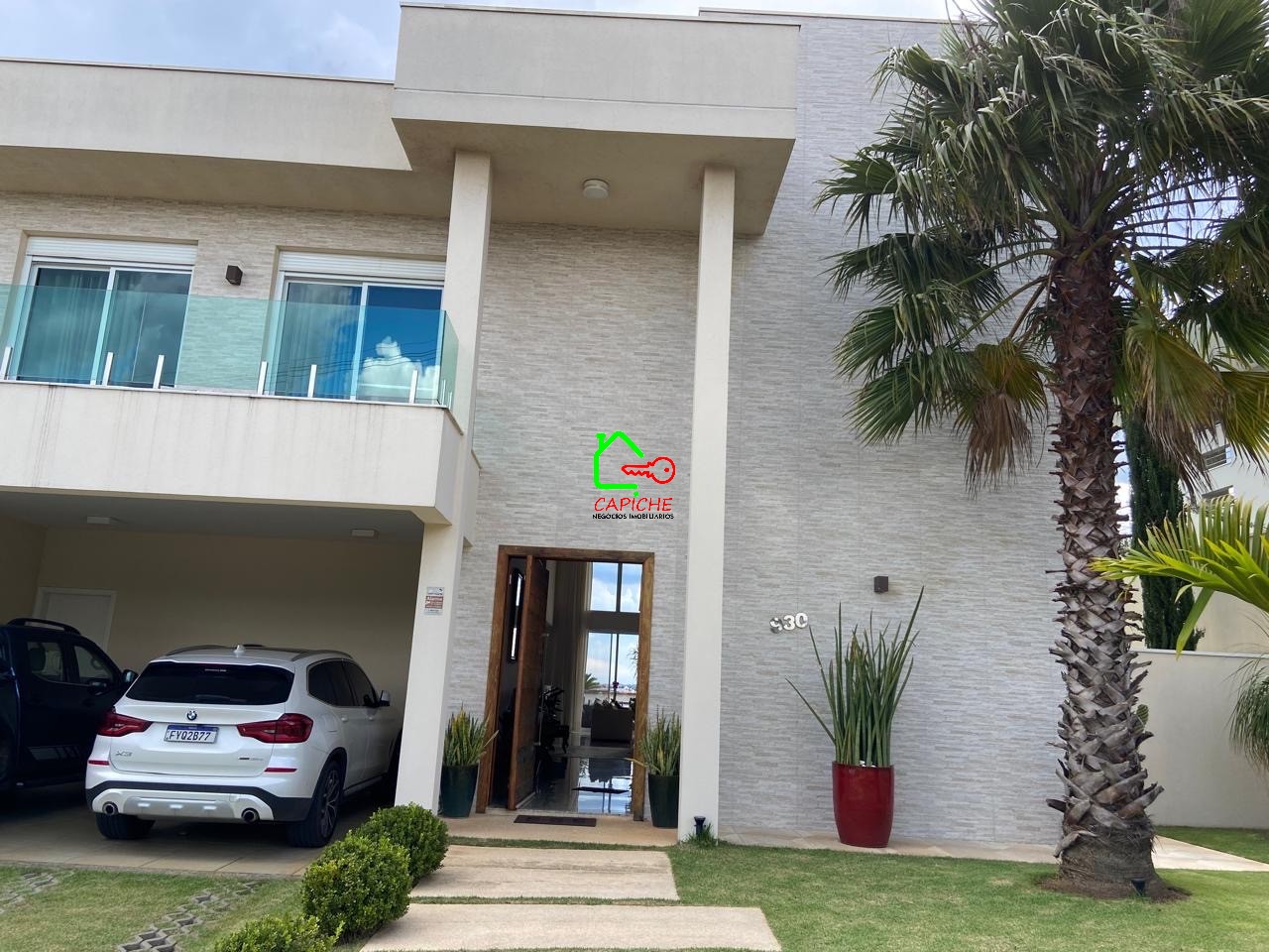 Casa de Condomínio à venda e aluguel com 4 quartos, 563m² - Foto 1