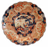 <p>Prato Medalhão Imari com bordas gomadas, 60 cm de diâmetro, Japão séc. XIX</p>