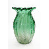 <p>Murano - Vaso de pasta de vidro, no formato cilíndrico, no tom verde claro, com pequenas gotas no corpo gomado - ass.na base - 25 altura - Itália Séc. XX.</p>