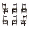 <p>6 Cadeiras estilo colonial, de madeira maciça escura, com espaldar e travessa frontal recortados em motivos ornamentais. Pernas retas e amarração inferior decorativa vazada - 45 x 45 x 97 cm alt - Brasil, séc XX</p>