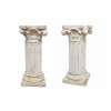 <p>Par de colunas decorativas em estilo clássico, de cimento pintado, com fuste canelado e capitel ornamentado em relevo sobre base quadrada - 80 cm de altura - No estado</p>
