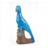 <p>Escultura de cerâmica esmaltada representando figura de pássaro, à maneira Cia. das Índias. Alt. 31 x 15 x 08cm. China, séc. XX</p>