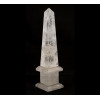 <p>Obelisco de cristal de rocha facetado. Alt. 34 x 09 x 09cm. Séc. XX (com pequenos bicados)</p>