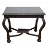<p>Mesa lateral de madeira maciça, finamente decorada com volutas entalhadas. Alt. 64 x 72 x 45cm. Brasil, Início séc. XX (precisa refixar uma das travas dos pés)</p>