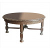 <p>Mesa de centro de madeira nobre macíca, possivelmente imbuia, decorada com ramagens, guirlandas e caneluras. Alt. 38 x 78cm. Brasil, início séc. XX (precisa refixar estrutura)</p>