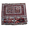 <p>Painel tribal caucasiano com técnica soumak, possivelmente Shahsavan, originalmente pertencente a mafrash ou bolsa nômade, com medalhões geométricos e faixa inferior em lã atada policromada. 77 x 93cm. Início século XX.</p>