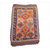 <p>Tapete Kilim caucasiano de forte caráter tribal, provavelmente do Azerbaijão caucásico ou Anatólia oriental, campo marfim natural decorado por grandes losangos escalonados policromos conectados em eixo vertical, acompanhados de pequenos motivos geométricos florais e cercaduras múltiplas em composição altamente gráfica, 230 x 150 cm = 3,45 m², primeira metade do século XX (no estado / com furos / precisa restauros)</p>