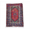 <p>Tapete persa Shiraz, campo vermelho com medalhão losangular central e composição geométrica tribal em azul, verde e marfim, bordaduras policromadas com motivos florais e elementos estilizados sobre fundo azul profundo, 148 x 100 cm = 1,48 m² (com restaudo / pontos rape)</p>